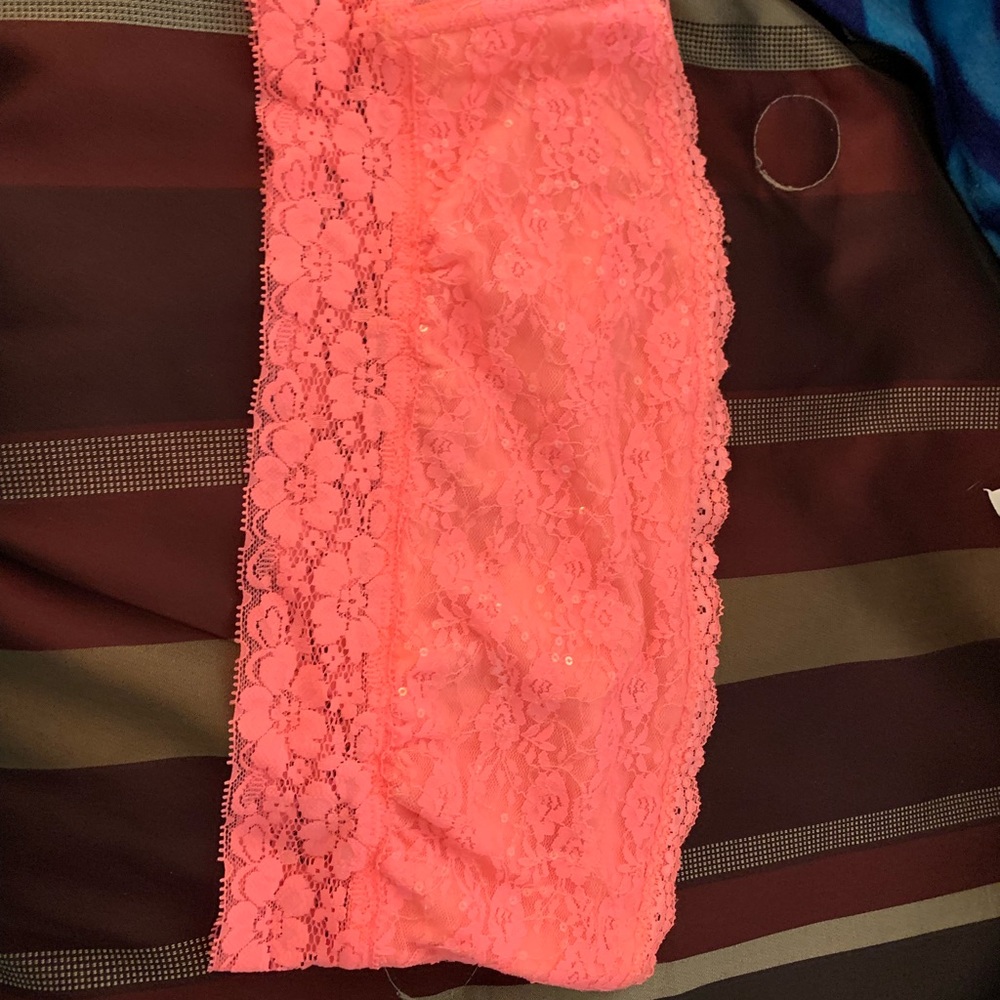 Two pink bralettes